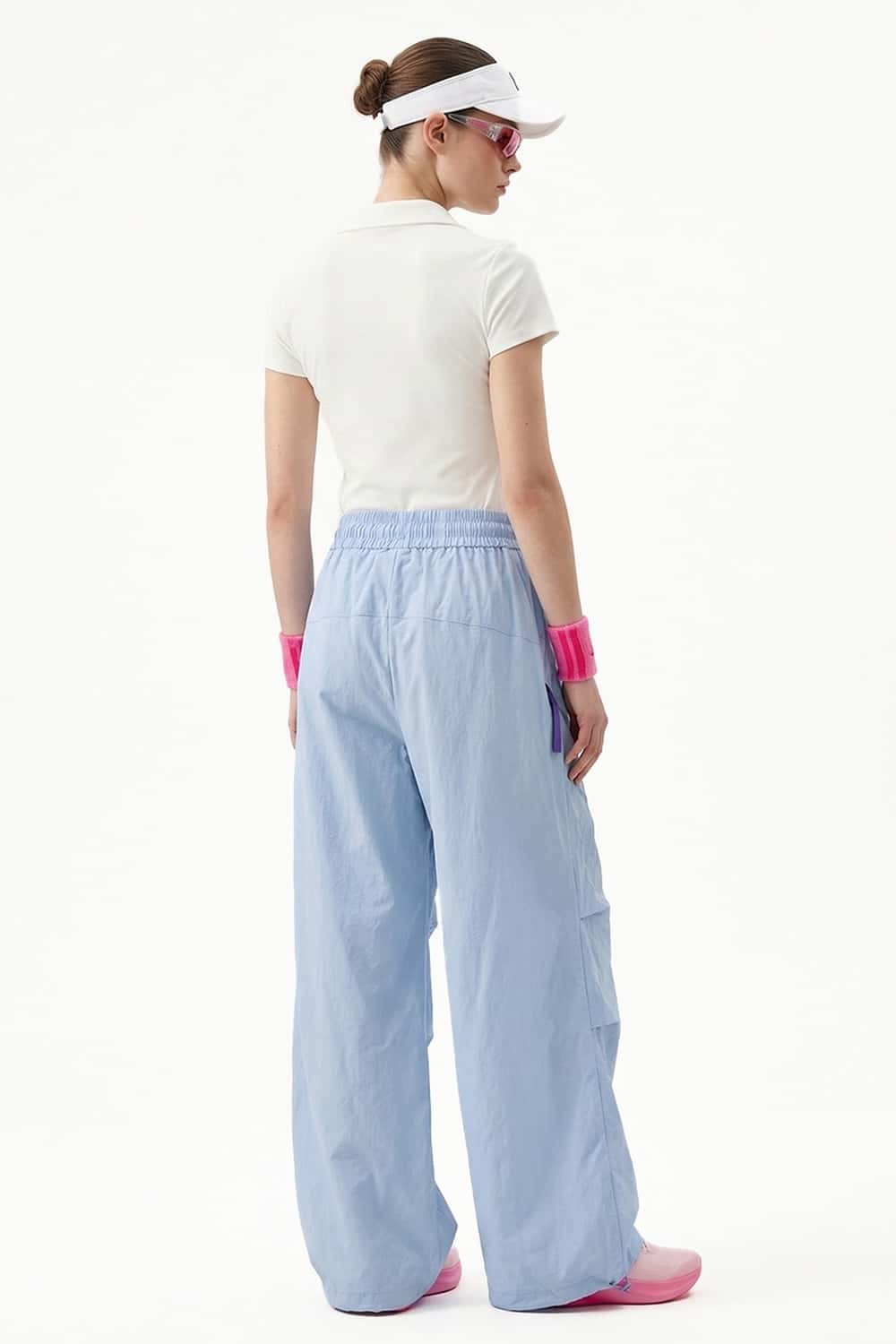 Waterproof Wide-Leg Pants with Drawstring Waist in Baby Blue - back modeled view