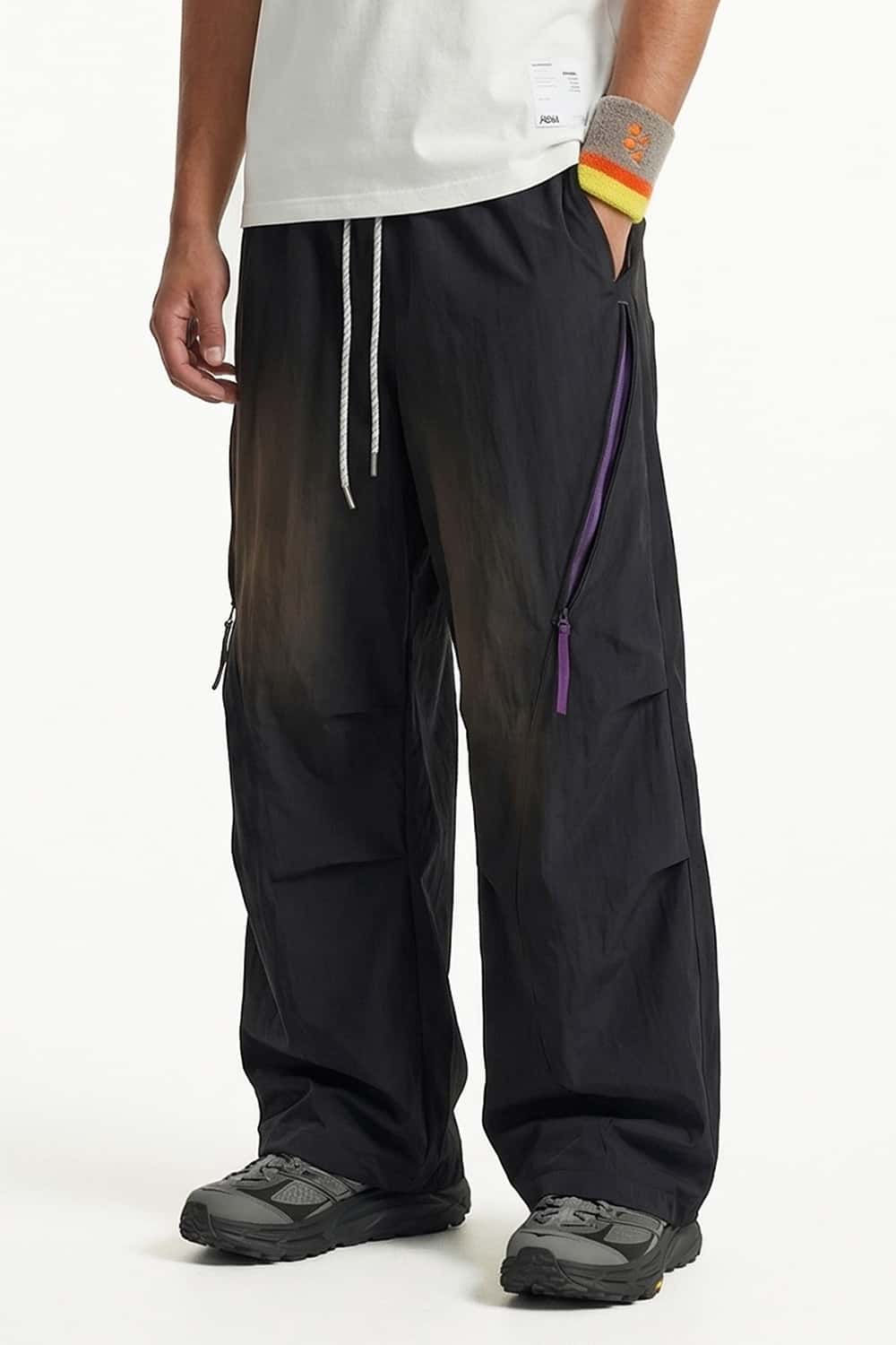 Waterproof Wide-Leg Pants with Drawstring Waist in Black - front modeled view
