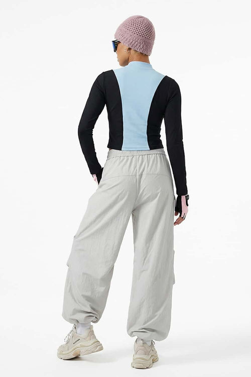 Waterproof Wide-Leg Pants with Drawstring Waist in Gray - rear three-quarter modeled view