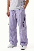 Waterproof Wide-Leg Pants with Drawstring Waist in Light Purple - front modeled view