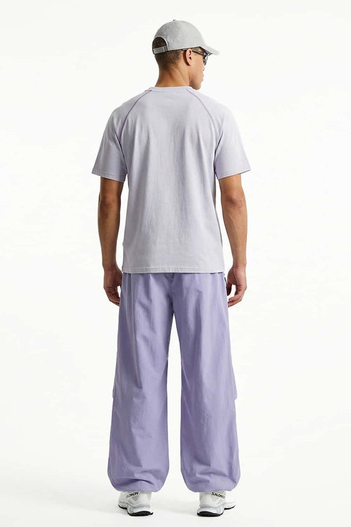 Waterproof Wide-Leg Pants with Drawstring Waist in Light Purple - back modeled view