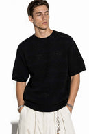 Breathable Short-Sleeve Knit Top with Openwork Bands in Black - full-length front modeled view