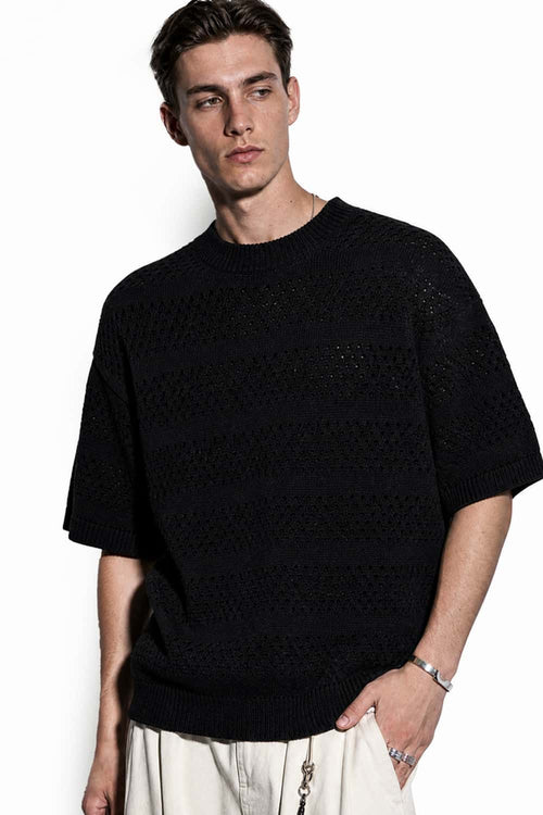 Breathable Short-Sleeve Knit Top with Openwork Bands in Black - front modeled view