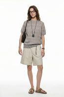 Breathable Short-Sleeve Knit Top with Openwork Bands in Khaki - full-length front modeled view