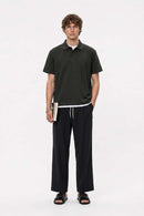Short-Sleeve Polo Shirt with Layered Details in Dark Gray - full-length front modeled view