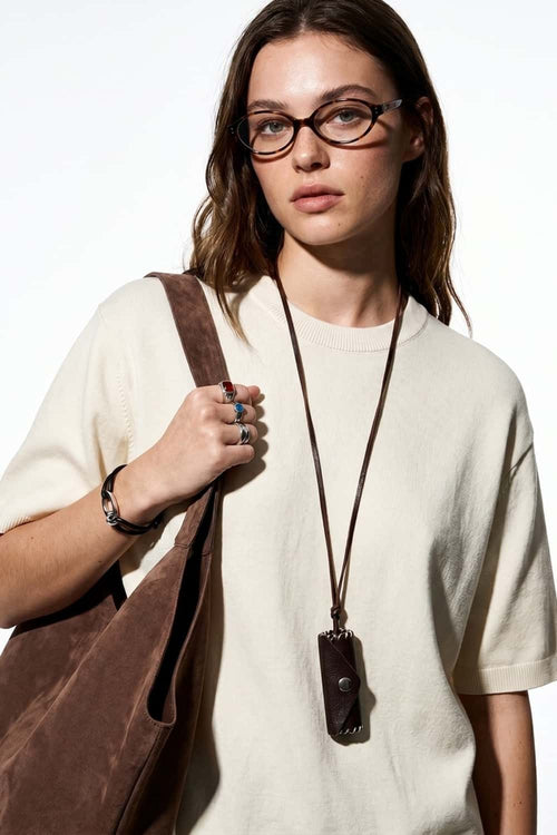 Short-Sleeve Knit Top with Dropped Shoulders in Beige - three-quarter front modeled view