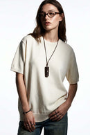 Short-Sleeve Knit Top with Dropped Shoulders in Beige - front modeled view