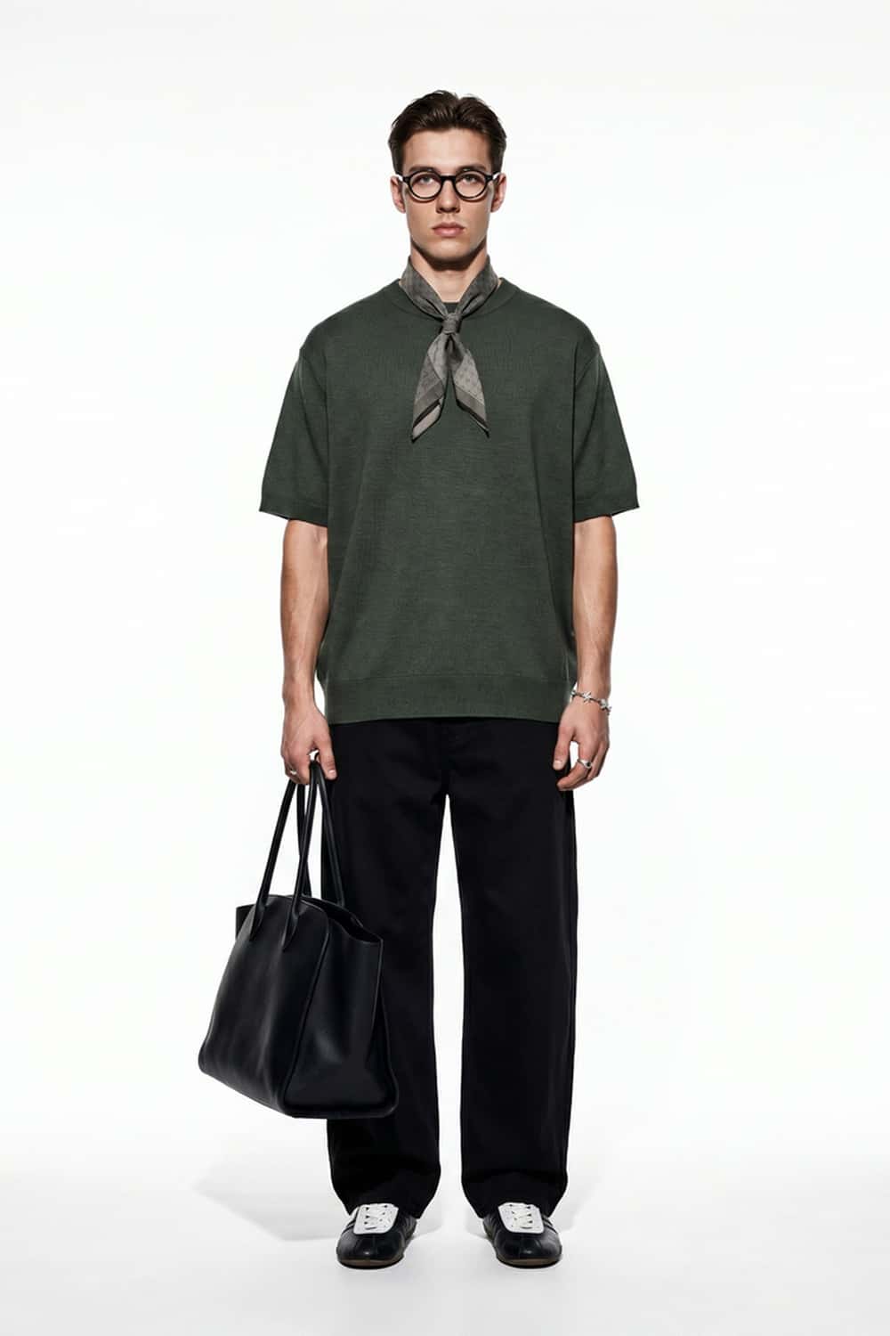 Short-Sleeve Knit Top with Dropped Shoulders in Military Green - full-length front modeled view
