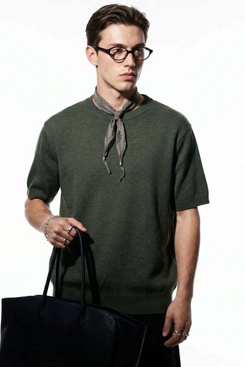 Short-Sleeve Knit Top with Dropped Shoulders in Military Green - three-quarter front modeled view