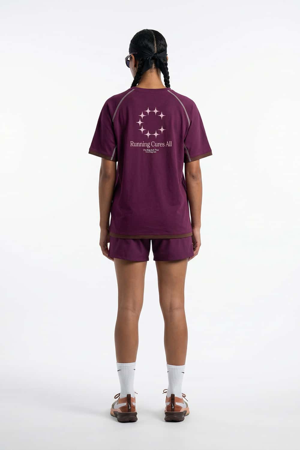 Sun-Protective Graphic T-Shirt with Raglan Sleeves in Dark Purple - full-length back modeled view