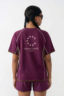 Sun-Protective Graphic T-Shirt with Raglan Sleeves in Dark Purple - back modeled close-up
