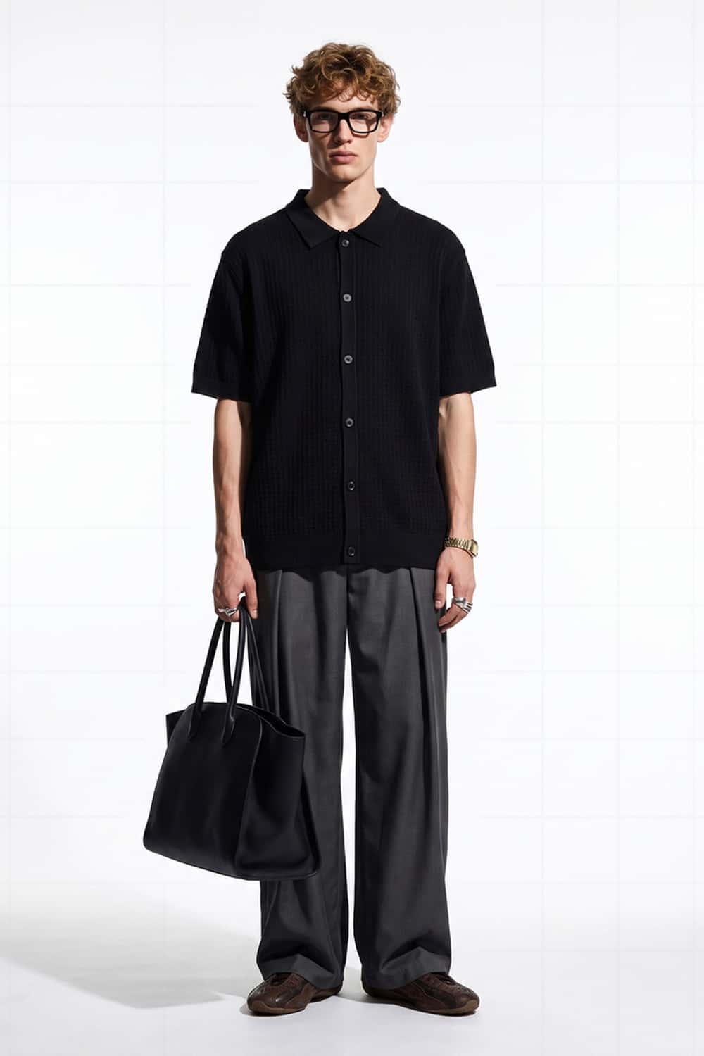 Textured Short-Sleeve Knit Shirt in Black - full-length front modeled view
