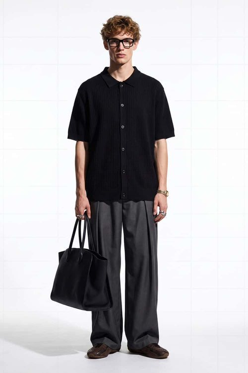 Textured Short-Sleeve Knit Shirt in Black - full-length front modeled view