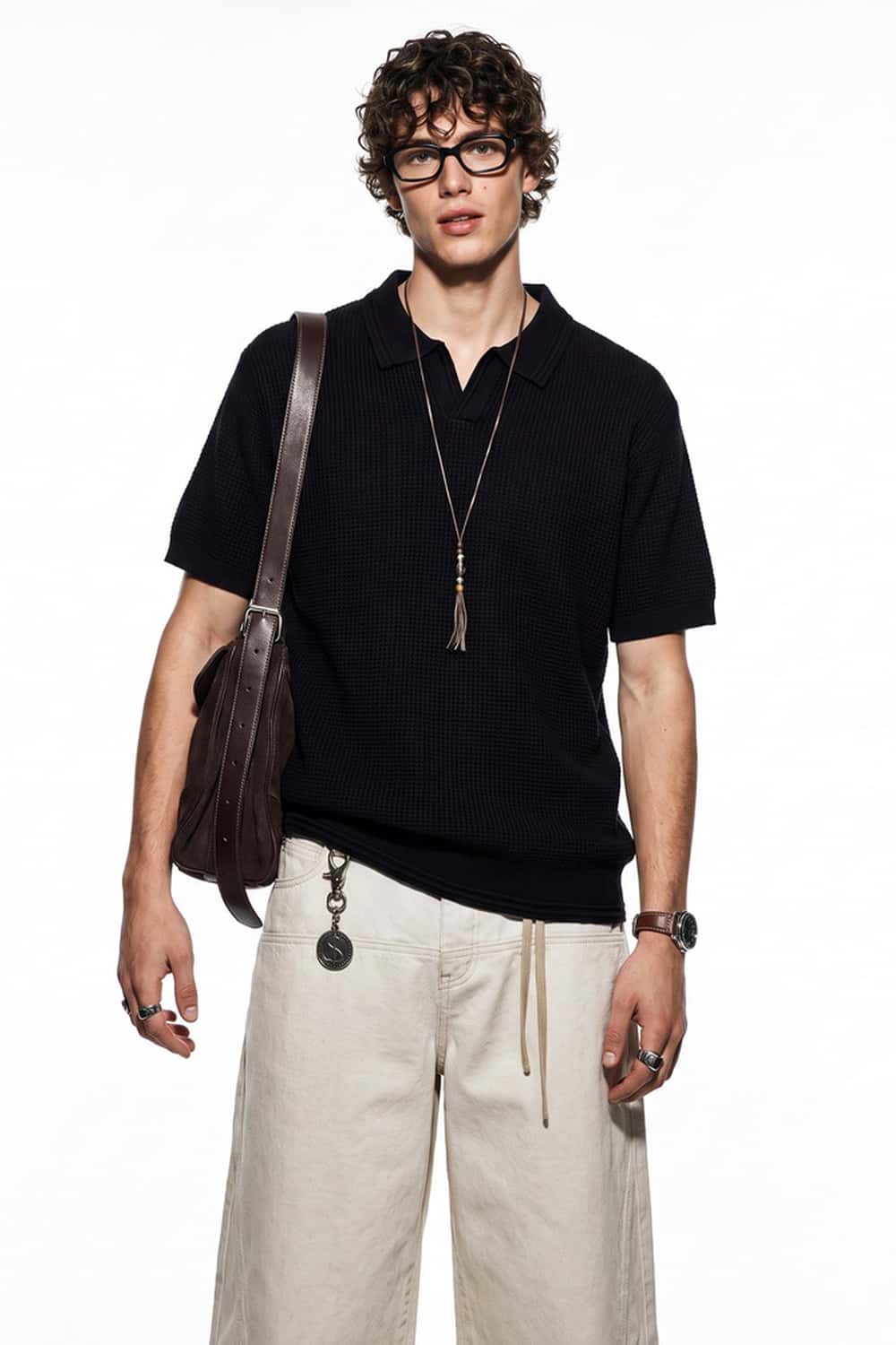 Open-Neck Textured Knit Polo in Black - full-length front modeled view
