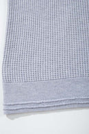 Open-Neck Textured Knit Polo in Gray - hem detail