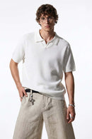 Open-Neck Textured Knit Polo in White - front modeled close-up