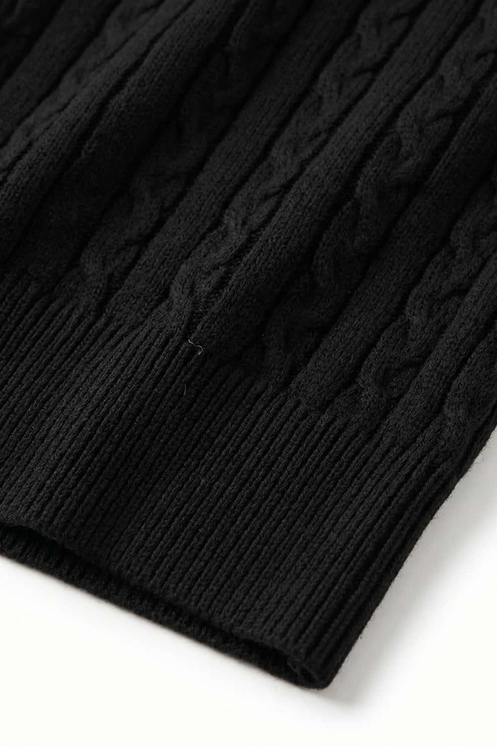 Cable-Knit Short-Sleeve Polo in Black - hem detail