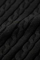 Cable-Knit Short-Sleeve Polo in Black - fabric texture close-up
