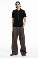 Cable-Knit Short-Sleeve Polo in Black - full-length front modeled view