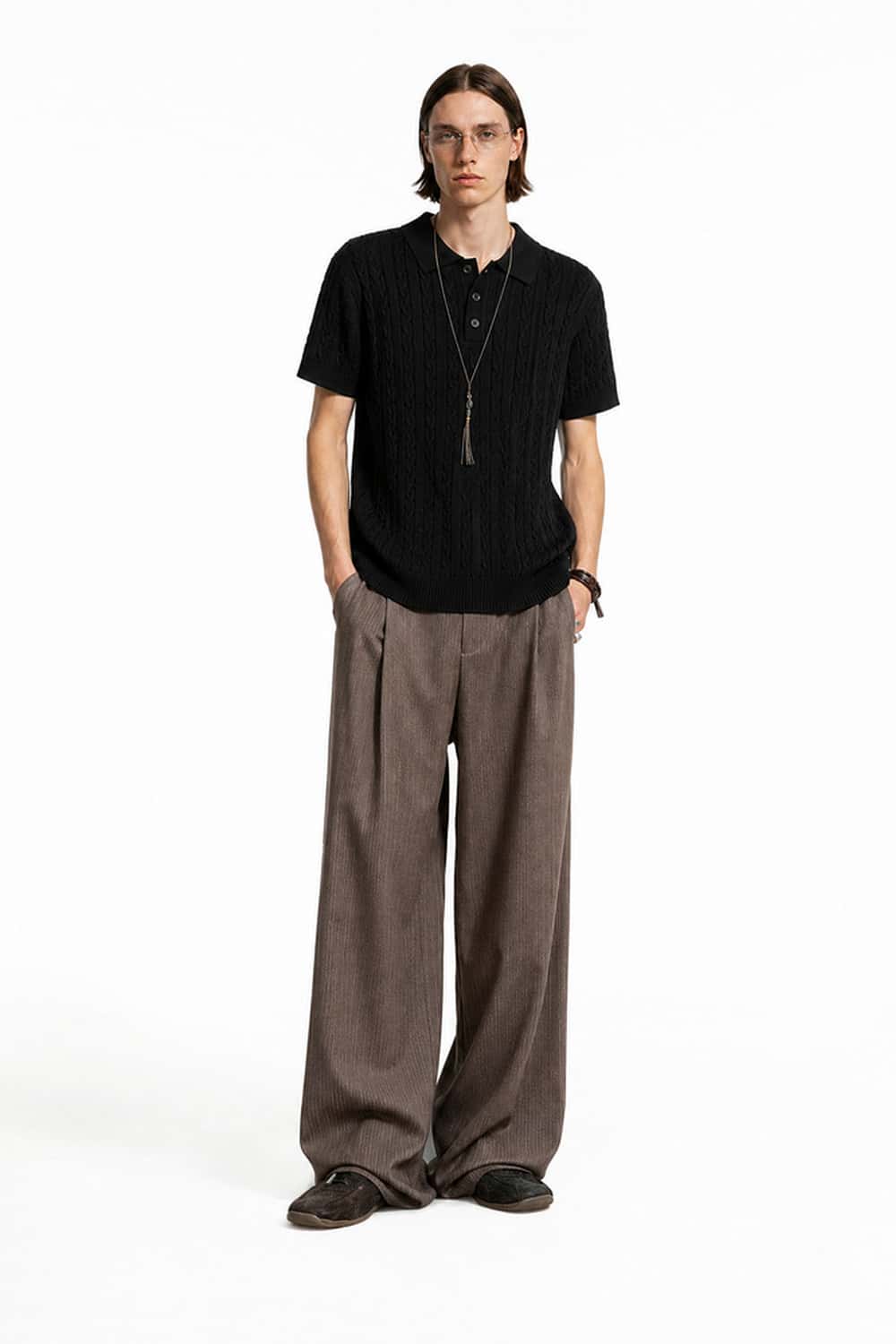 Cable-Knit Short-Sleeve Polo in Black - full-length front modeled view