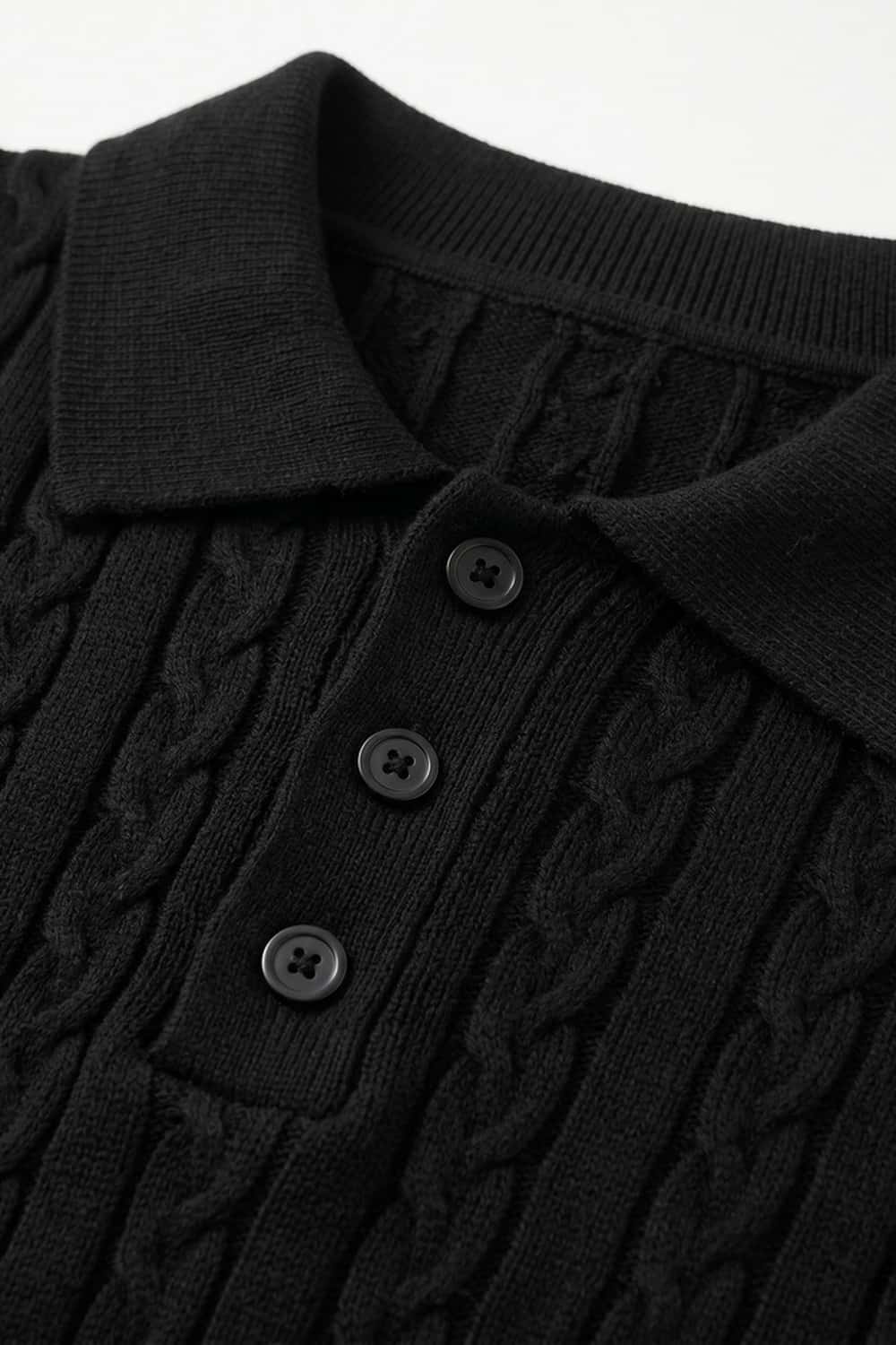 Cable-Knit Short-Sleeve Polo in Black - collar and placket close-up