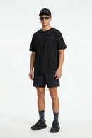 Reflective Star-Graphic Performance T-Shirt in Black - full-length front modeled view