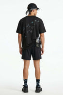 Reflective Star-Graphic Performance T-Shirt in Black - full-length back modeled view
