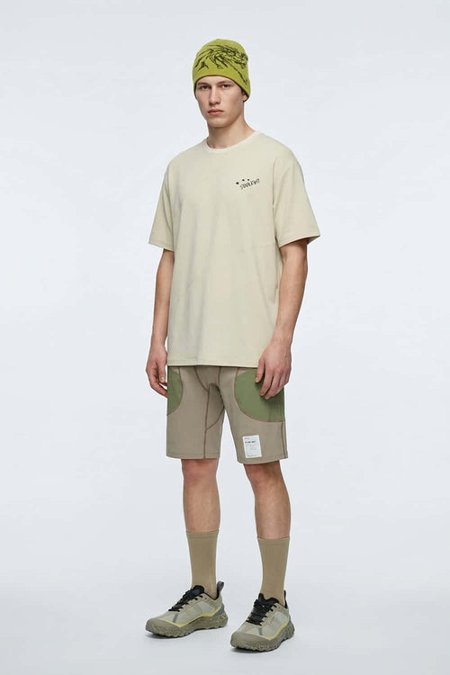 Reflective Star-Graphic Performance T-Shirt in Light Khaki - full-length front modeled view
