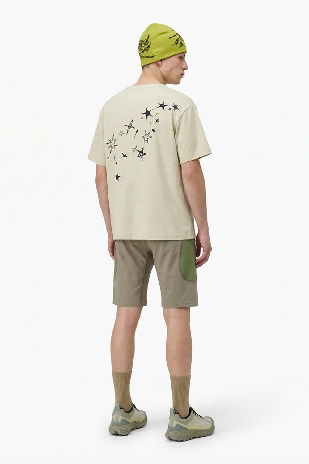 Reflective Star-Graphic Performance T-Shirt in Light Khaki - full-length back modeled view