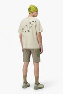 Reflective Star-Graphic Performance T-Shirt in Light Khaki - full-length back modeled view