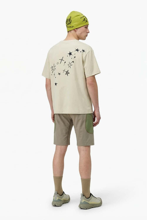 Reflective Star-Graphic Performance T-Shirt in Light Khaki - full-length back modeled view