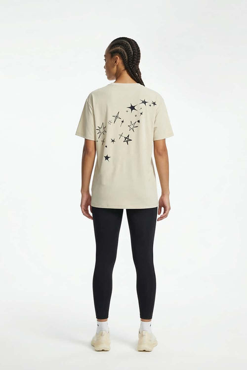 Reflective Star-Graphic Performance T-Shirt in Light Khaki - full-length back modeled view