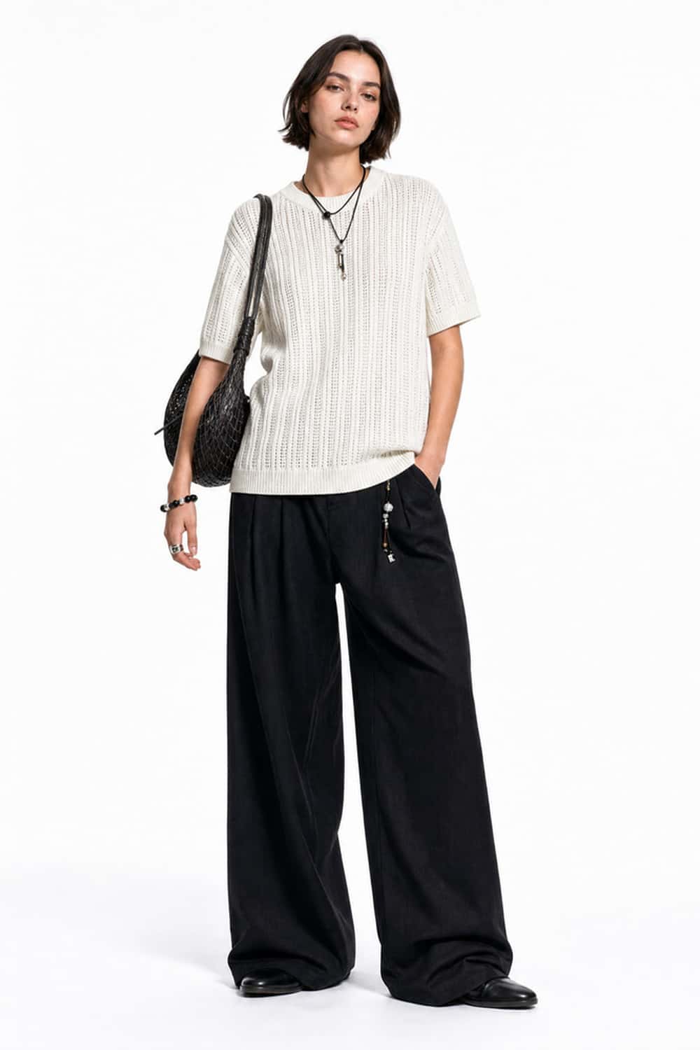 Openwork Textured Knit T-Shirt in Apricot - full-length front modeled view