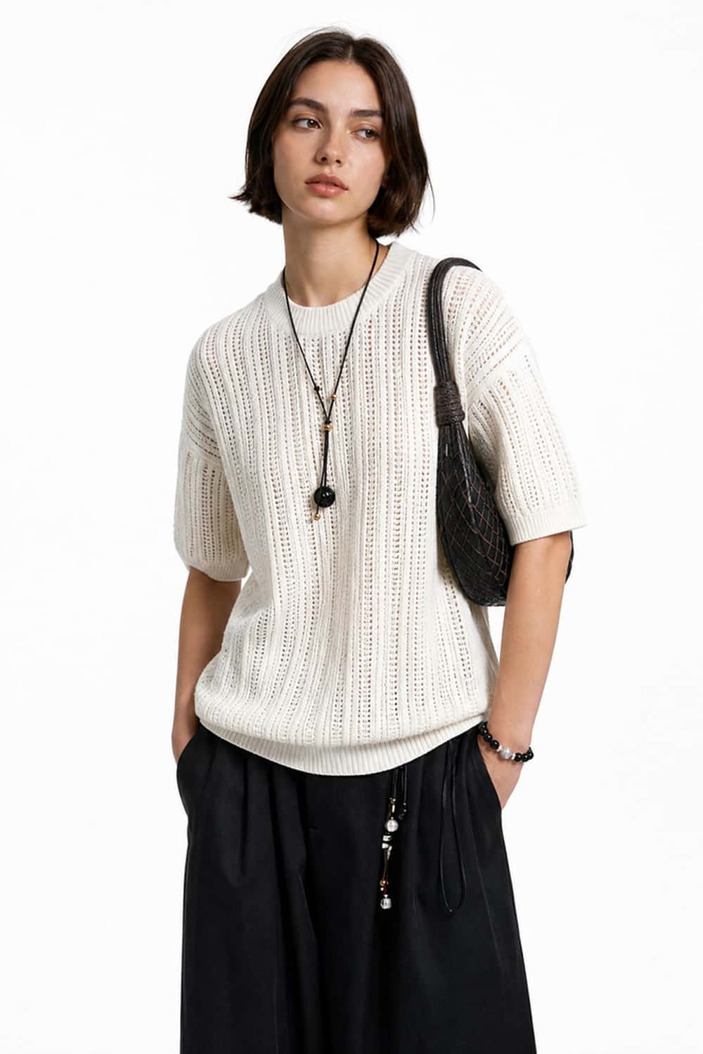 Openwork Textured Knit T-Shirt in Apricot - front modeled close-up