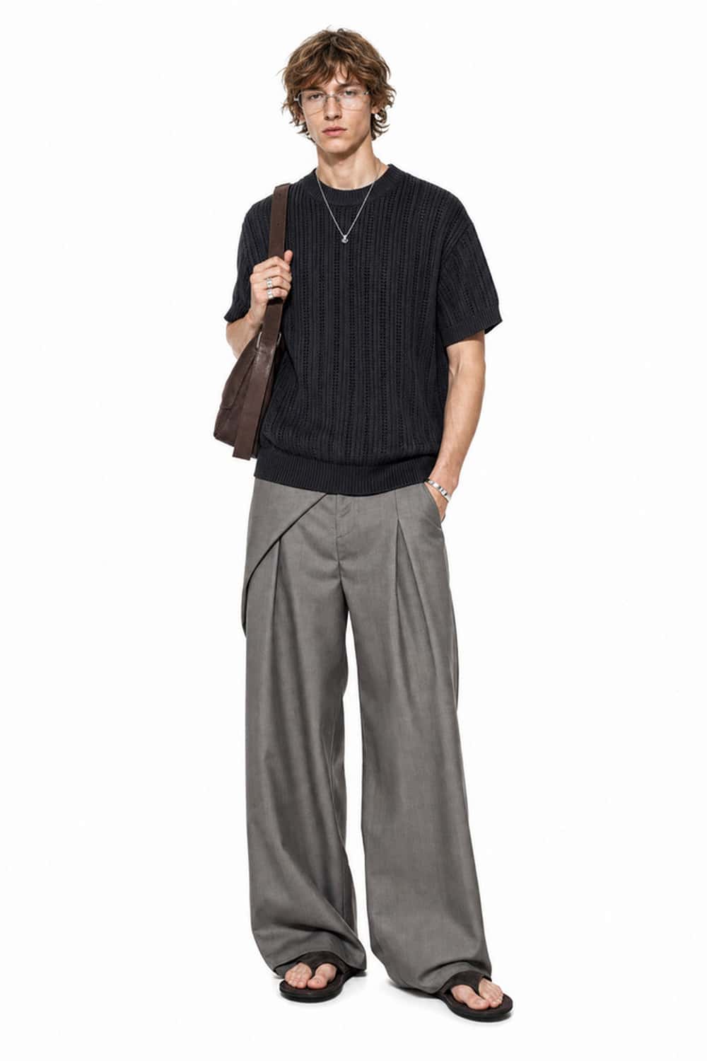 Openwork Textured Knit T-Shirt in Black - full-length front modeled view