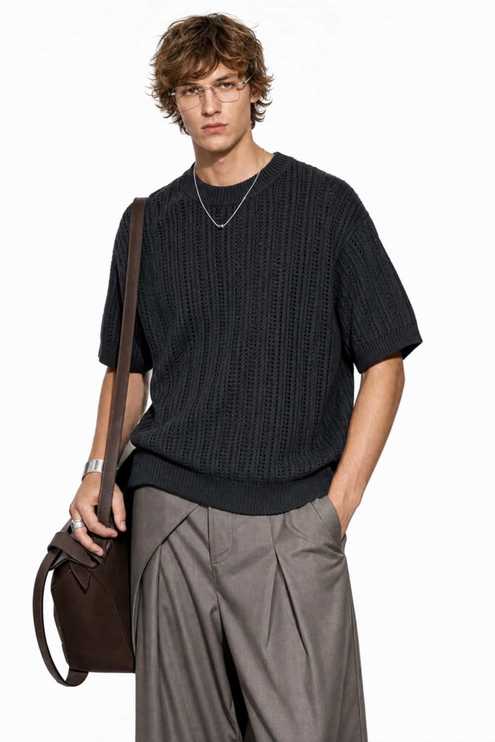 Openwork Textured Knit T-Shirt in Black - front modeled close-up
