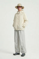 Waterproof Drawstring Trousers with Adjustable Hems in Khaki - full-length front modeled view