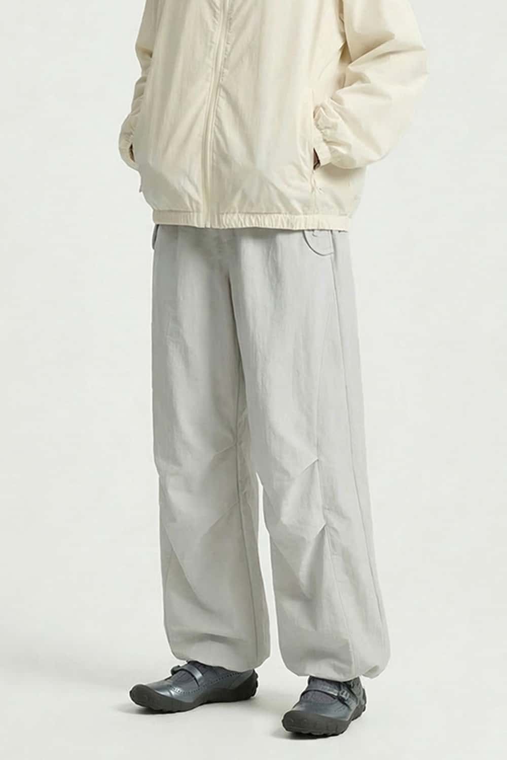 Waterproof Drawstring Trousers with Adjustable Hems in Khaki - front modeled view