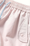 Waterproof Drawstring Trousers with Adjustable Hems in Light Pink - pocket detail