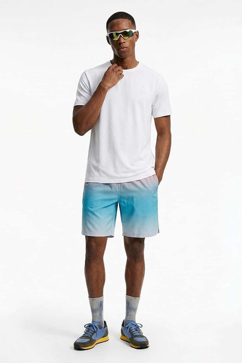 Lightweight Star-Graphic Running T-Shirt in Off White - full-length front modeled view