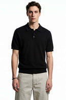 Relaxed Short-Sleeve Knit Polo Shirt in Black - full-length front modeled view