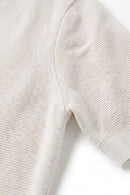 Relaxed Short-Sleeve Knit Polo Shirt in White - product detail close-up