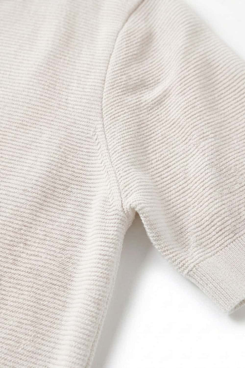 Relaxed Short-Sleeve Knit Polo Shirt in White - product detail close-up