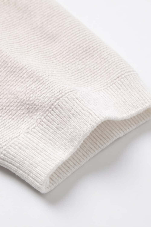 Relaxed Short-Sleeve Knit Polo Shirt in White - cuff detail