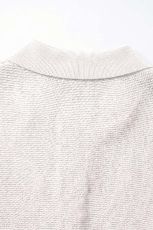Relaxed Short-Sleeve Knit Polo Shirt in White - back collar detail