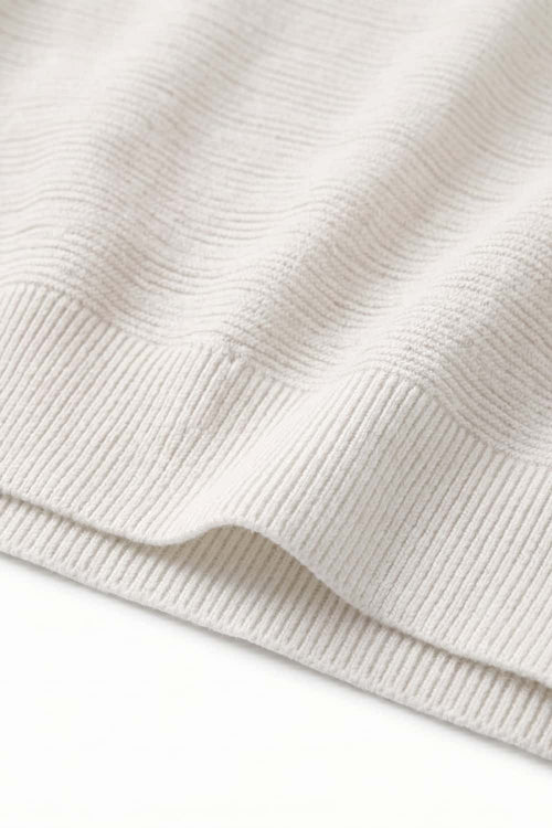 Relaxed Short-Sleeve Knit Polo Shirt in White - hem detail