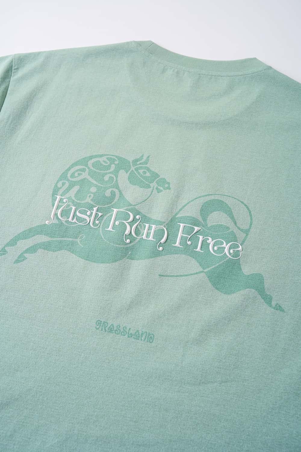Cool-Touch Sun-Protective Graphic T-Shirt in Green - back flat lay product view