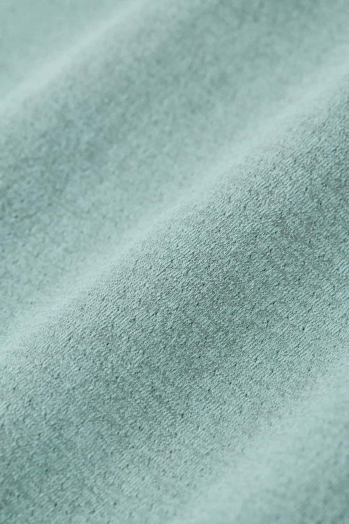 Cool-Touch Sun-Protective Graphic T-Shirt in Green - fabric texture close-up