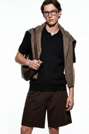 Lightweight Cable-Knit Polo Shirt in Black - full-length front modeled view