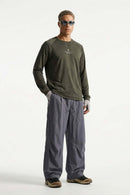 Waterproof Wide-Leg Drawcord Trousers in Dark Gray - full-length front modeled view